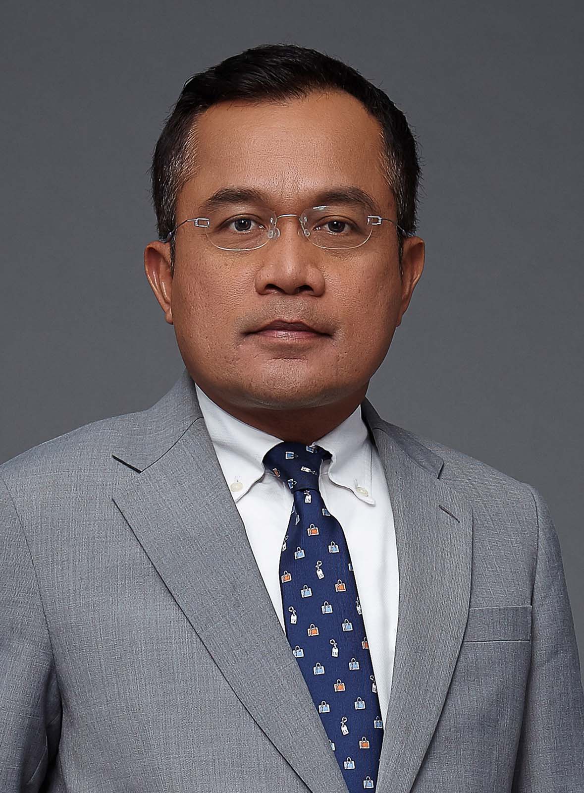 Mr. Surasak Suttamas
